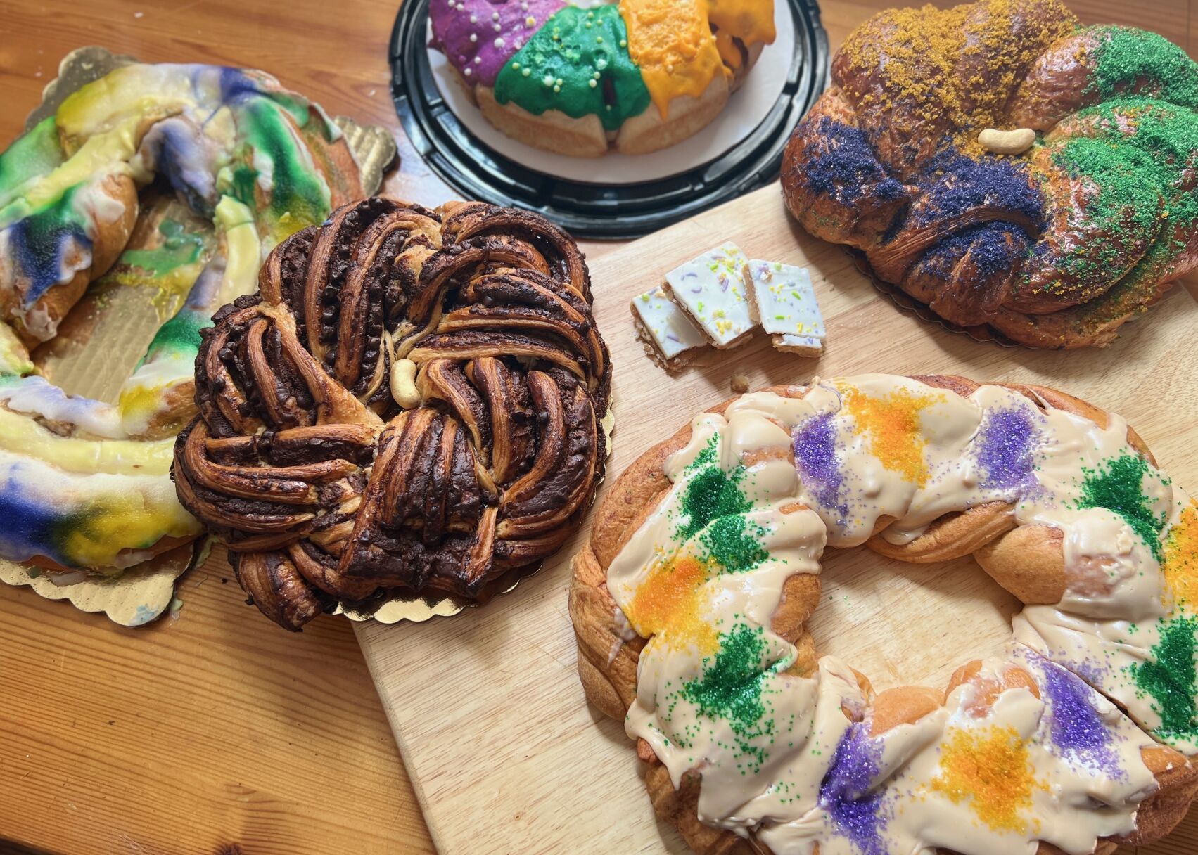 Robért Fresh Market - Our VooDoo King Cake is a Bavarian-cream-filled  brioche topped with chocolate ganache, pecans and shredded coconut. It's  one of our signature cakes and a highlight of Mardi Gras
