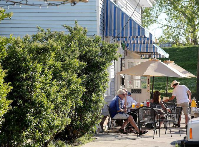 Ian McNulty Dining by levee, arriving by ferry Entertainment/Life