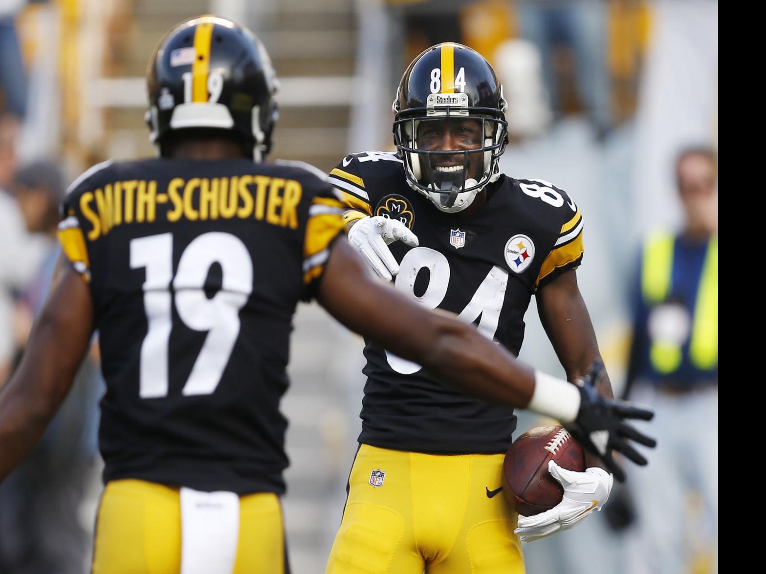 FILE - In this Oct. 1, 2017, file photo, Pittsburgh Steelers quarterback  Ben Roethlisberger (7) celebrates a touchdown by running back Le'Veon Bell  during the first half of an NFL football game