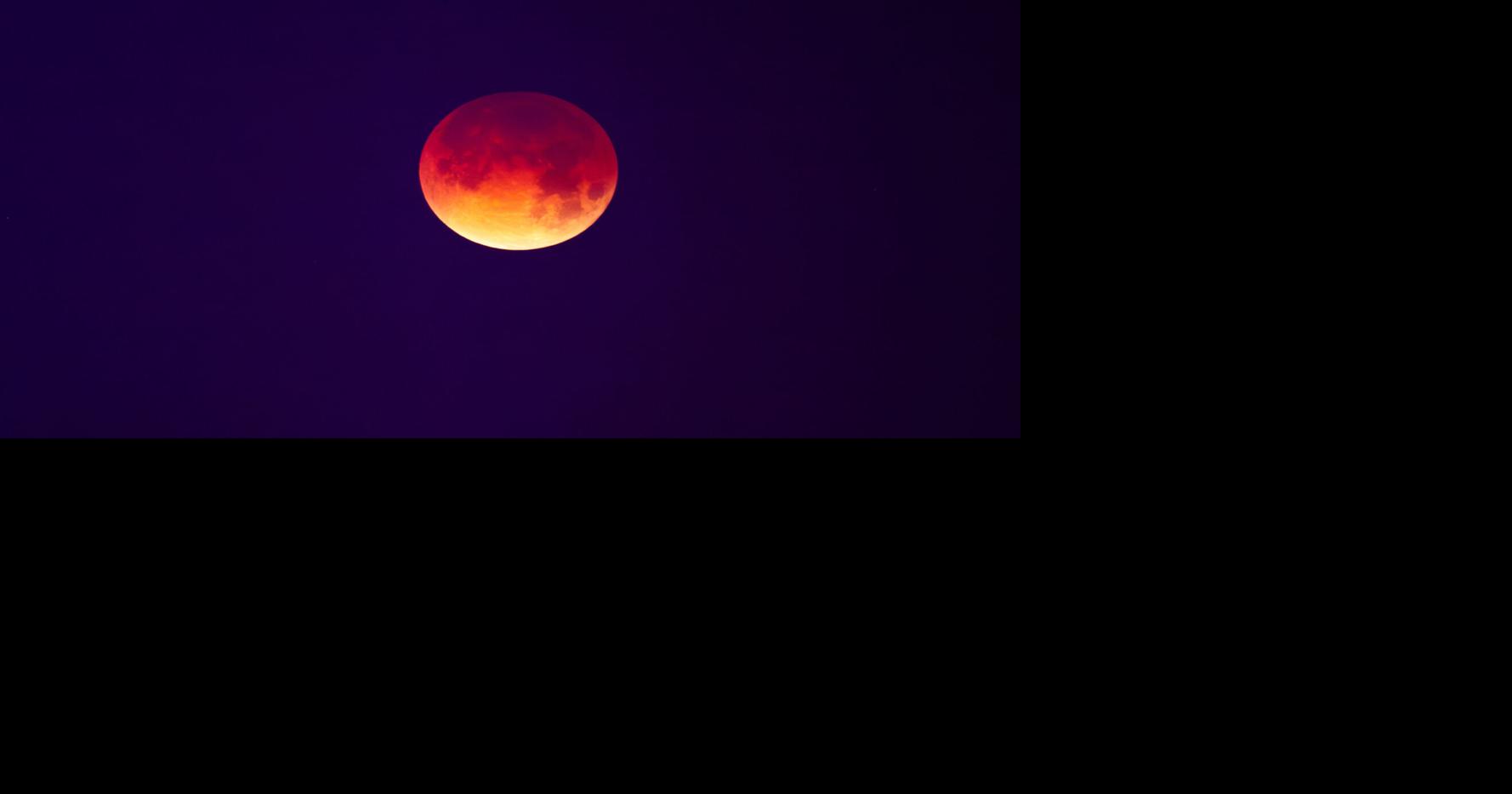A rare lunar eclipse, or Blood Worm Moon, rose over New Orleans. See photos.