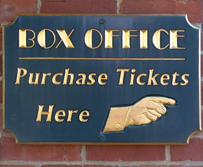 Brass and gold box office sign