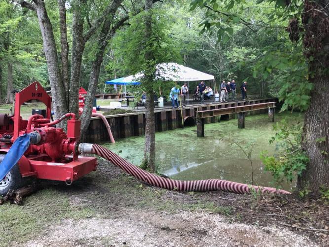 Pumps begin draining canal in Jean Lafitte National Park in search for