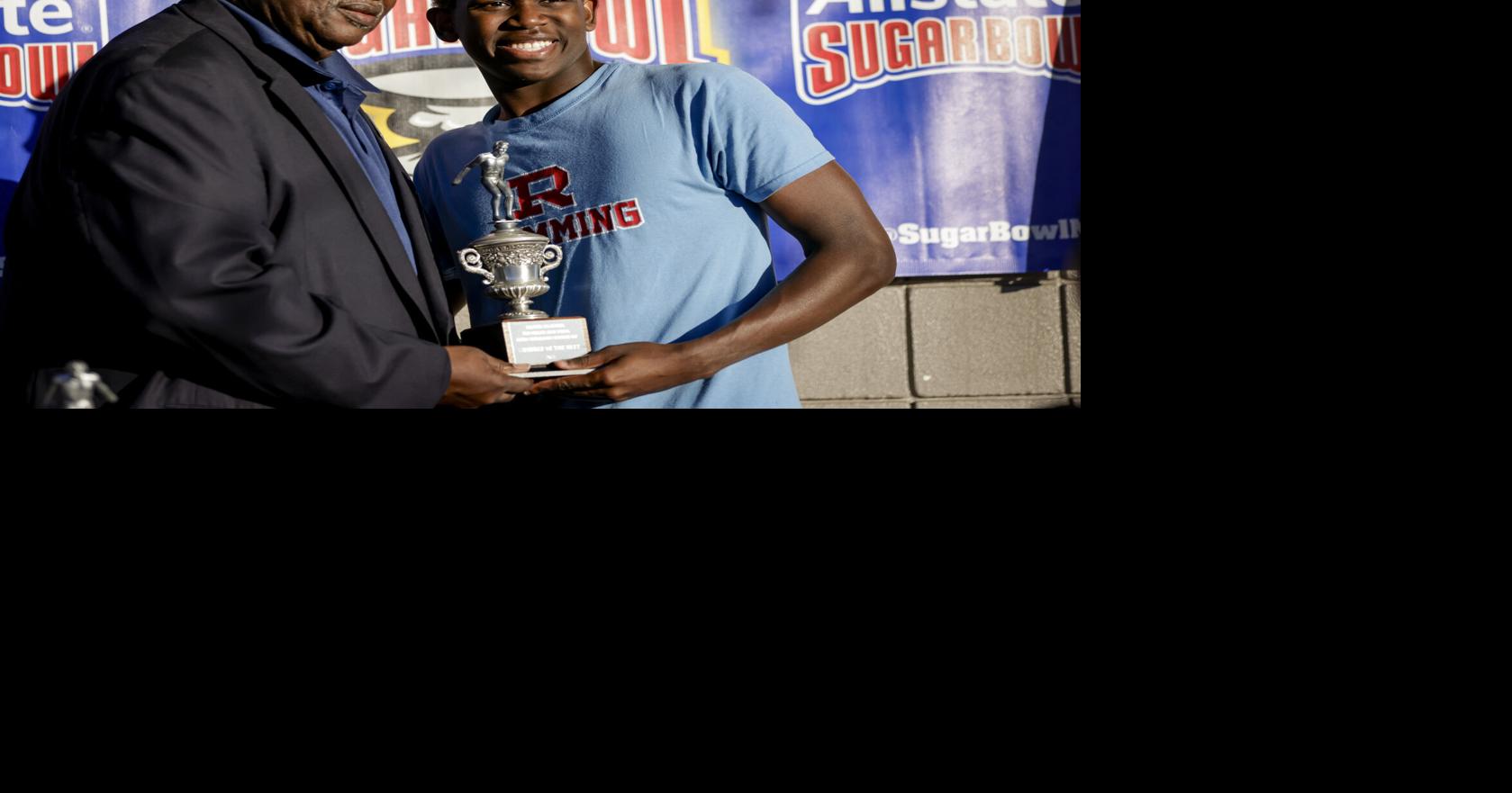 He learned to swim so his grandfather would let him go fishing. Now ...