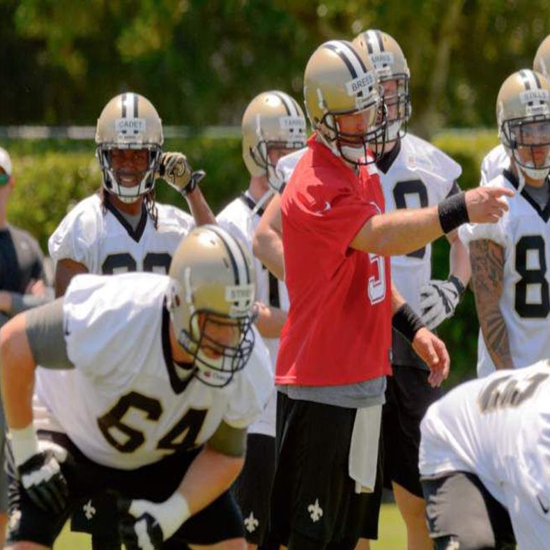 Football Cremation Urn & New Orleans Saints Hover Helmet Décor