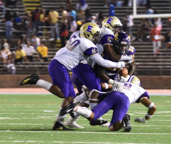 Warren Easton 18, St. Augustine 0 Lance Legendre paces Eagles with two