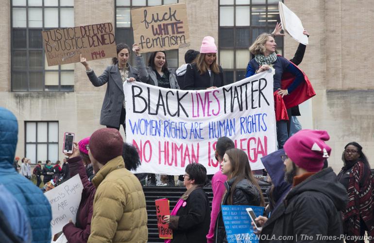 Here's why some women are wearing red to work or not working at all