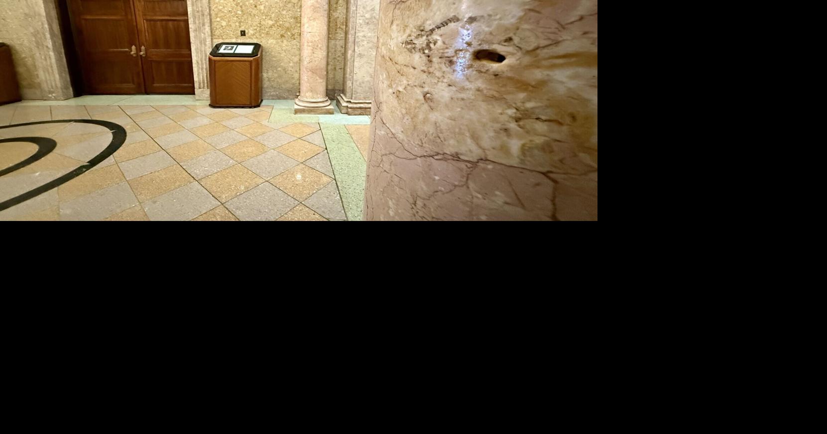 Are the bullet holes from the shooting of Huey Long still visible in Louisiana's State Capitol?