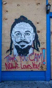 Coronavirus Graffiti Pops Up On Frenchmen Street Is That A Face