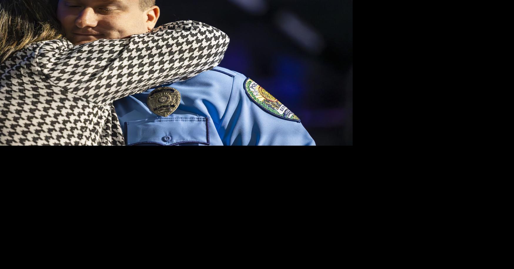 Photos: At police academy graduation, a solemn reminder of law ...