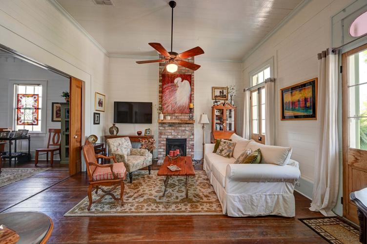 Lakefront location and historic charm make 1893 Old Mandeville cottage