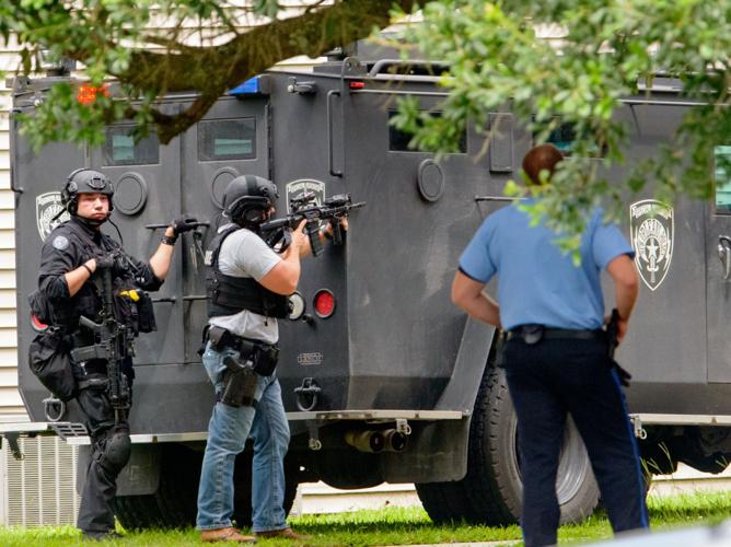 New Orleans Police officer fired at man who pointed weapon at her in ...