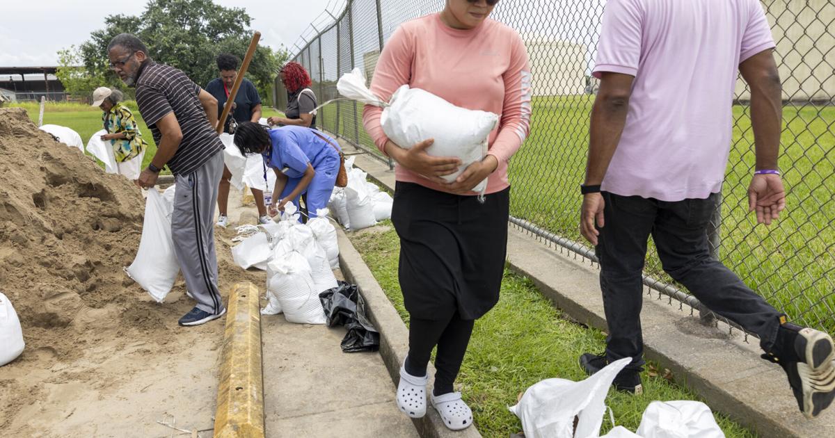 Storm preparations are under way as New Orleans officials anticipate street flooding