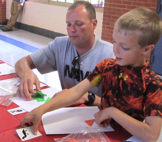 Mandeville Middle School Literacy Luau makes learning fun St. Tammany