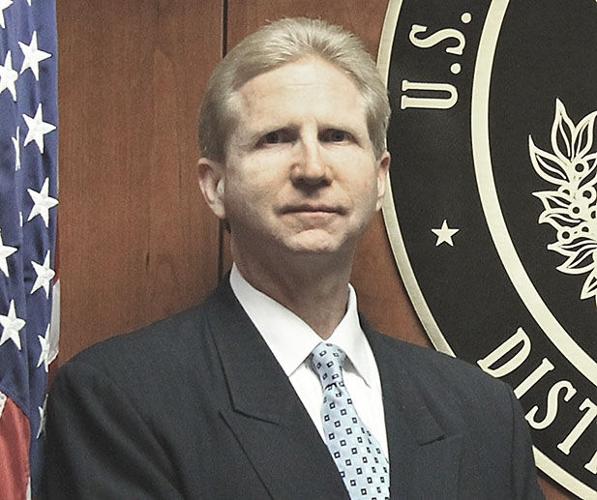 Former Norfolk teacher reconnects with student who went on to have