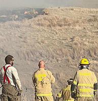 Area firefighters help battle big wildfire near Cambridge