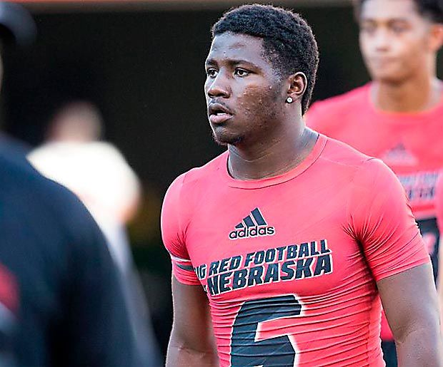 Darnay Holmes gets Army All-American jersey by day, stars on field