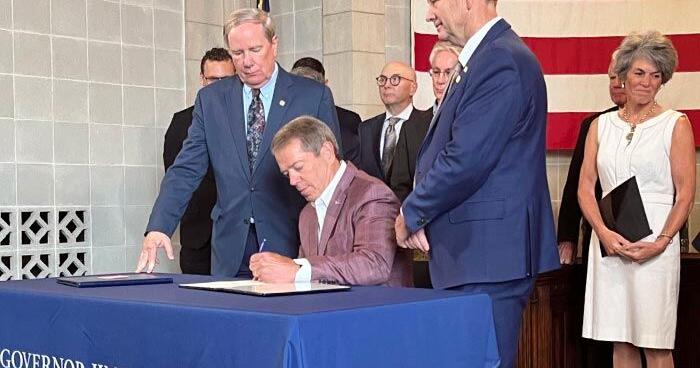 Pillen signs bill aimed at expanding power generation while shielding ratepayers from costs