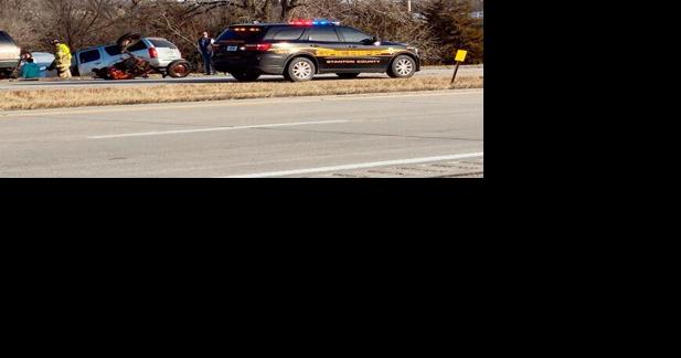 Three injured in crash east of Norfolk involving tractor, SUV