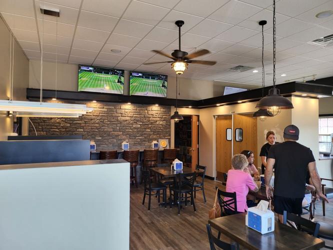 Popular bagel shops moves, expands menu Business