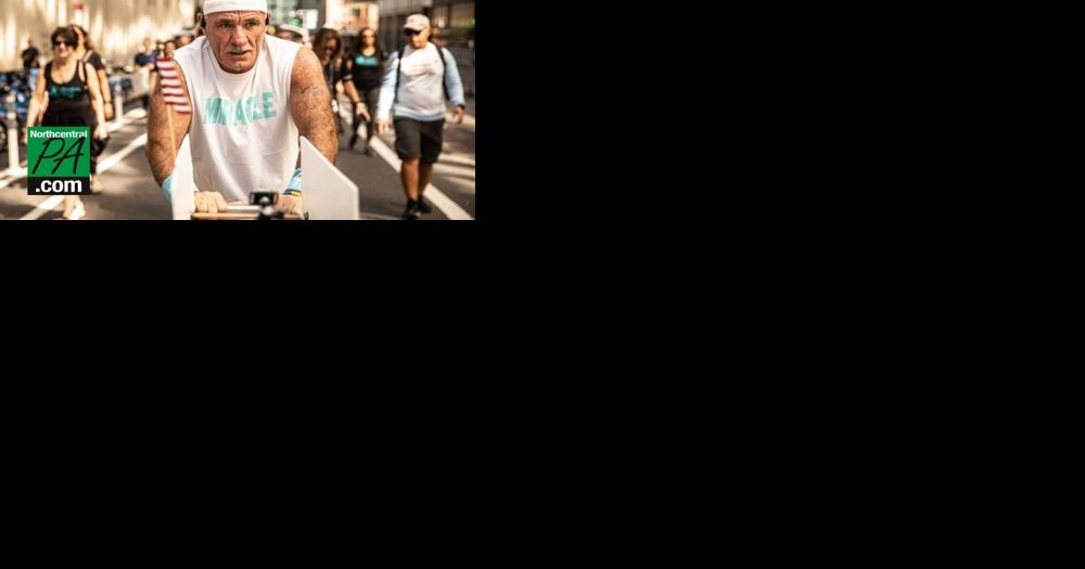 Man walks across Pa. with beverage cart in honor of 9/11 - Vimarsana News