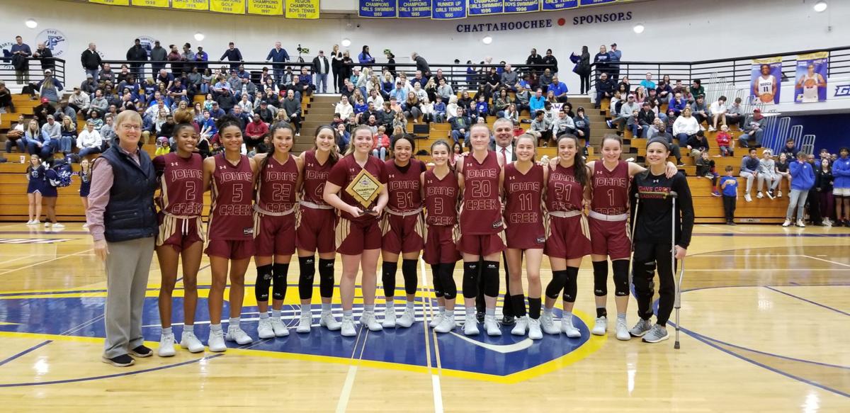 Johns Creek girls hold off Bears to capture school’s first region title