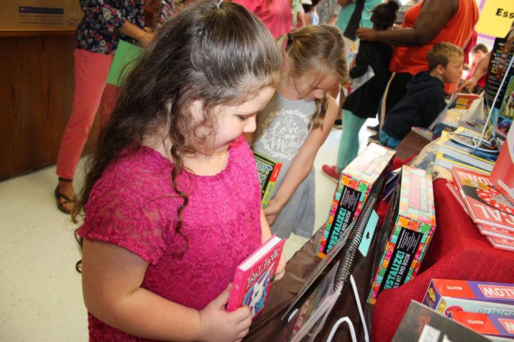 Grandparents and books at Cave Spring Elementary Gallery