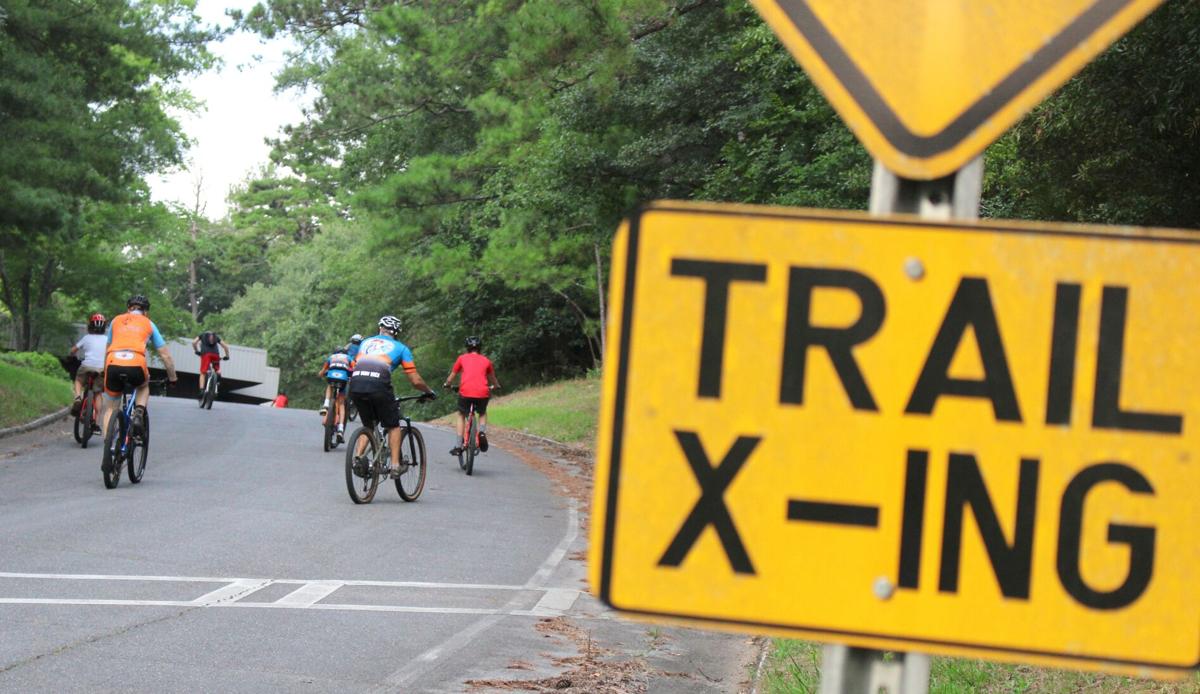 Youth mountain bike team practices at Jackson Hill in preparation for race at Kingston Downs