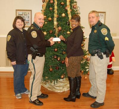Sheriff S Office Donates 1 800 To Open Door Home The Rome News