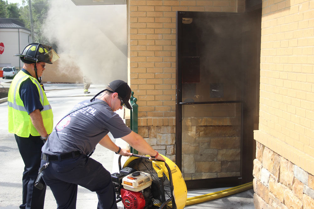 Update Fire causes extensive damage to Popeyes on Shorter Avenue