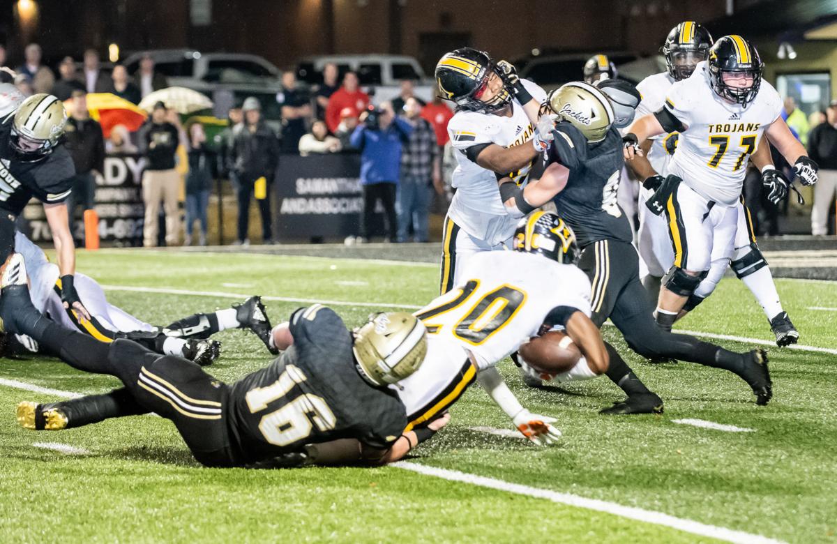 Prep Football Jackets Fall In Final Four To Peach County The