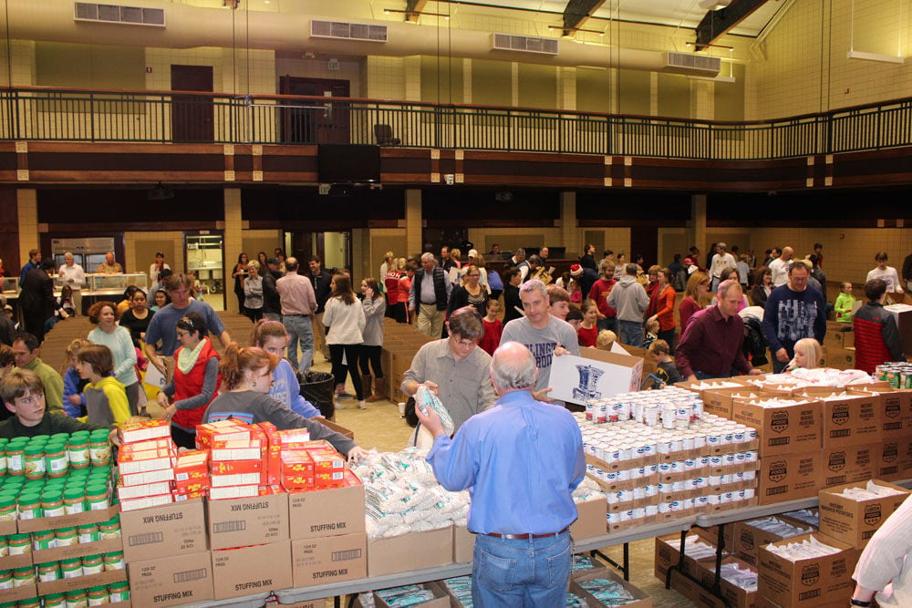 First Presbyterian Church members pack Christmas food boxes for needy ...