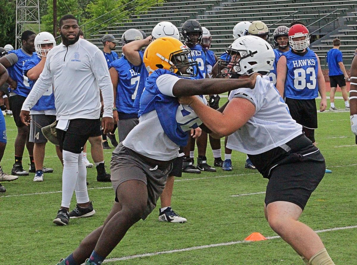 SHORTER FOOTBALL Hawks seek talent at camps Colleges