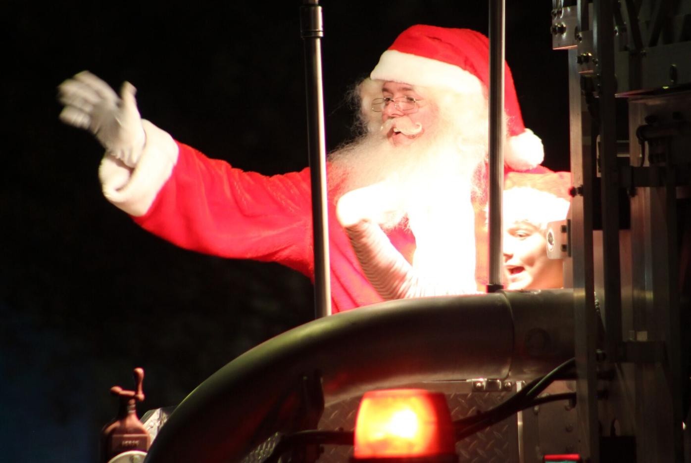 Christmas parades bring out crowds to downtowns