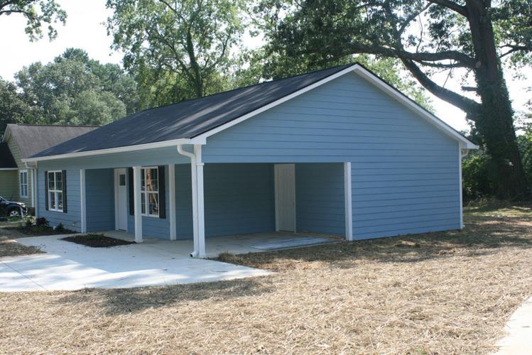 Last 2 ‘Happy Houses’ for sale on Wilson Avenue in South Rome, part of