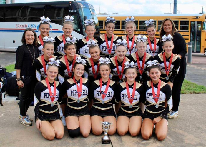 Pepperell cheer with state runner-up trophy