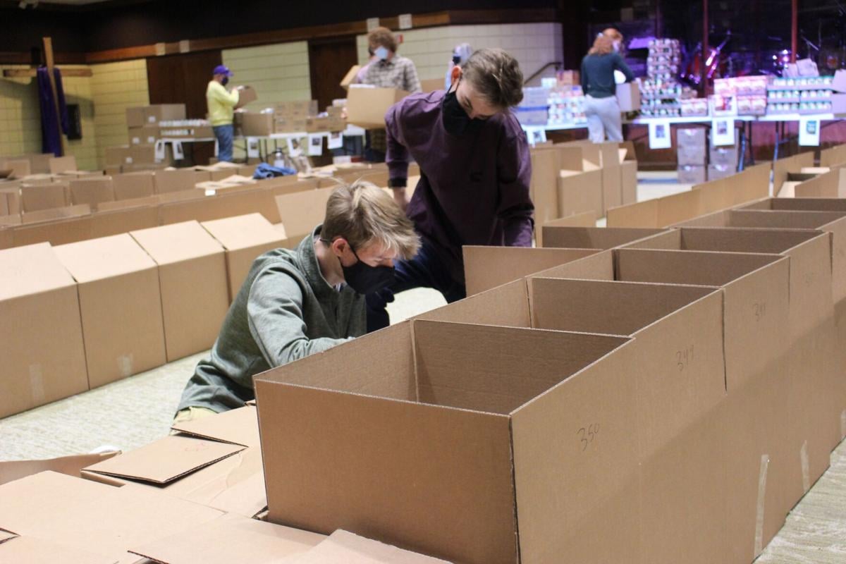 First Presbyterian Church distributes more than 600 boxes of food to needy local families