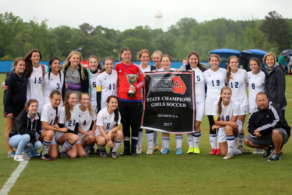 PREP SOCCER Unity Christian battles its opponent, elements to win 2nd