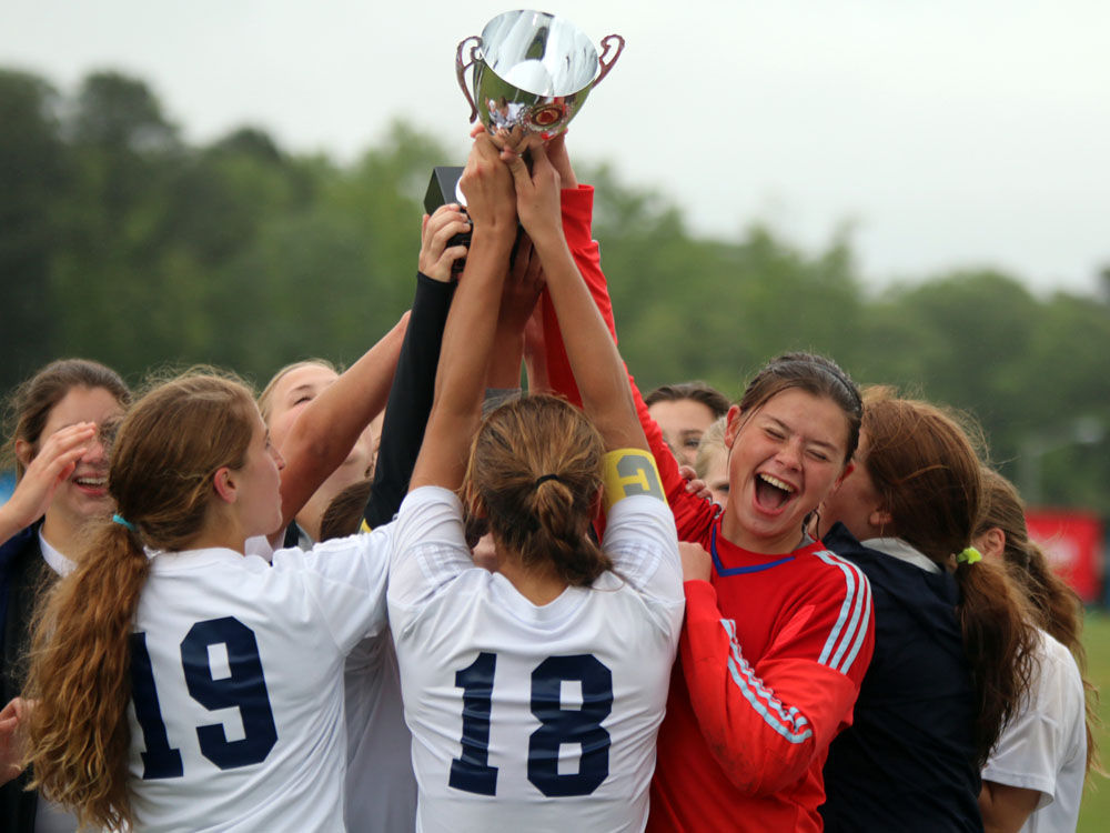PREP SOCCER Unity Christian battles its opponent, elements to win 2nd