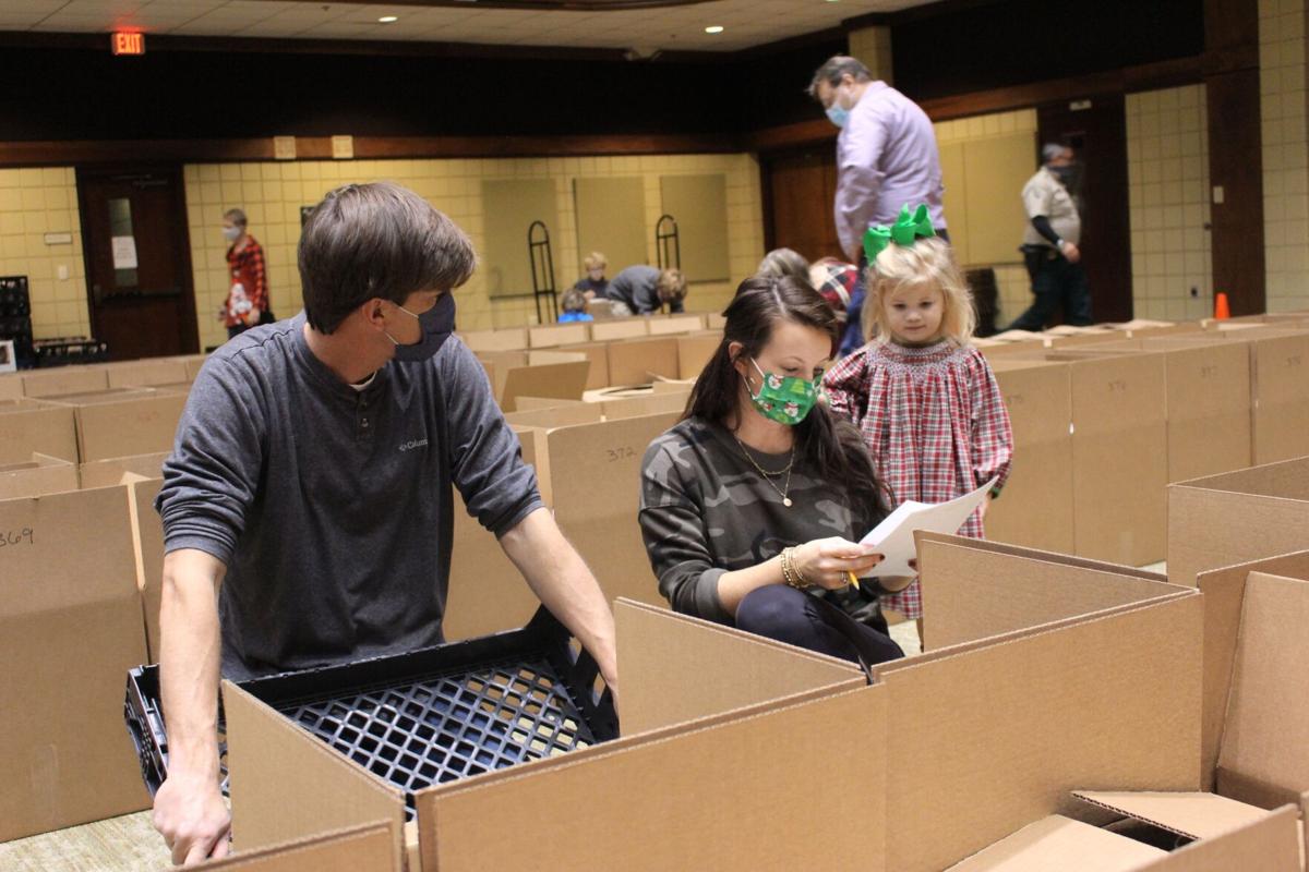 First Presbyterian Church distributes more than 600 boxes of food to needy local families