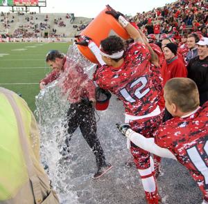 Jacksonville State football coach John Grass gets doused with ice water following the Gamecocks' 56-28 victory over Southeast Missouri on Saturday. The win clinched the Ohio Valley Conference championship. Photo courtesy of Steve Latham/NW Georgia News