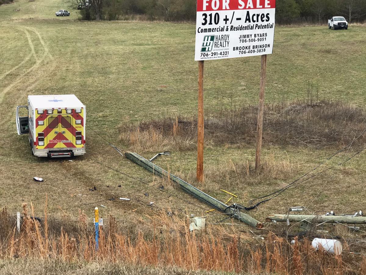Wreck with power pole near U.S. 411 and the loop