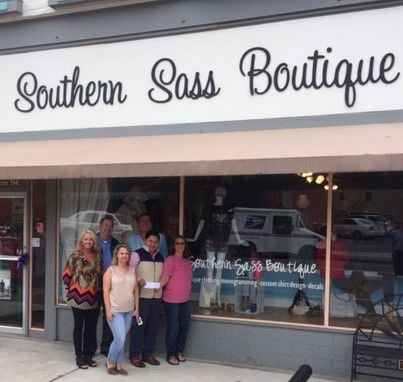 Check presented to Southern Sass Boutique from Downtown Cedartown