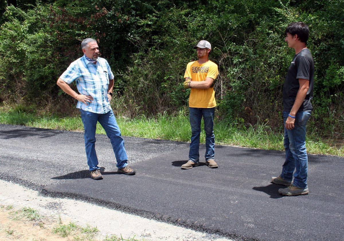 Talk at junction of trail surfaces