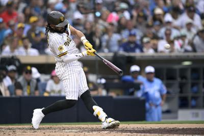 Fernando Tatis Jr. of the San Diego Padres hits a three-run home run during the seventh inning against the Kansas City Royals at Petco Park on Saturday, June 21, 2025, in San Diego.