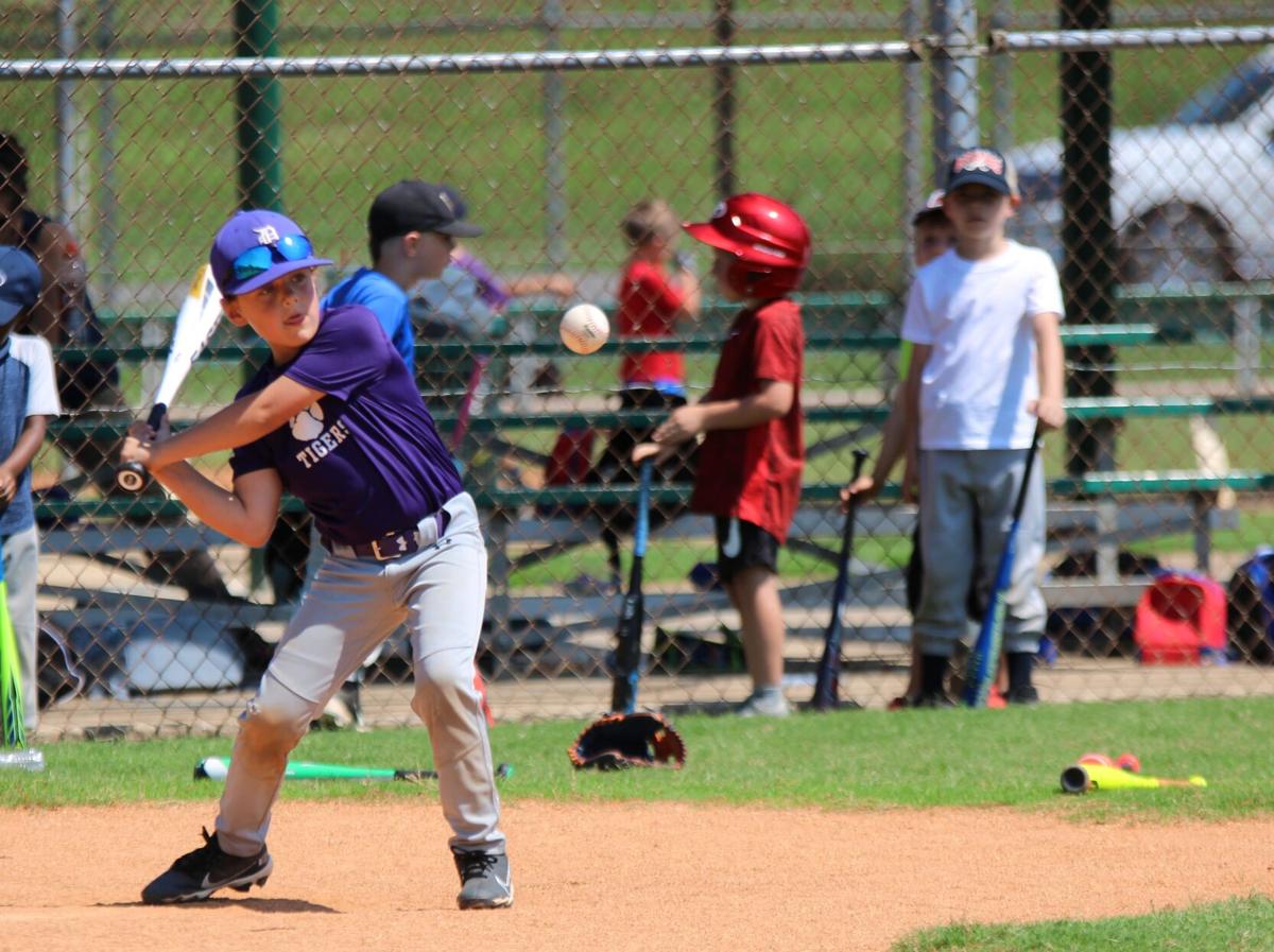 Summer baseball fundamentals camp continues behind the levee