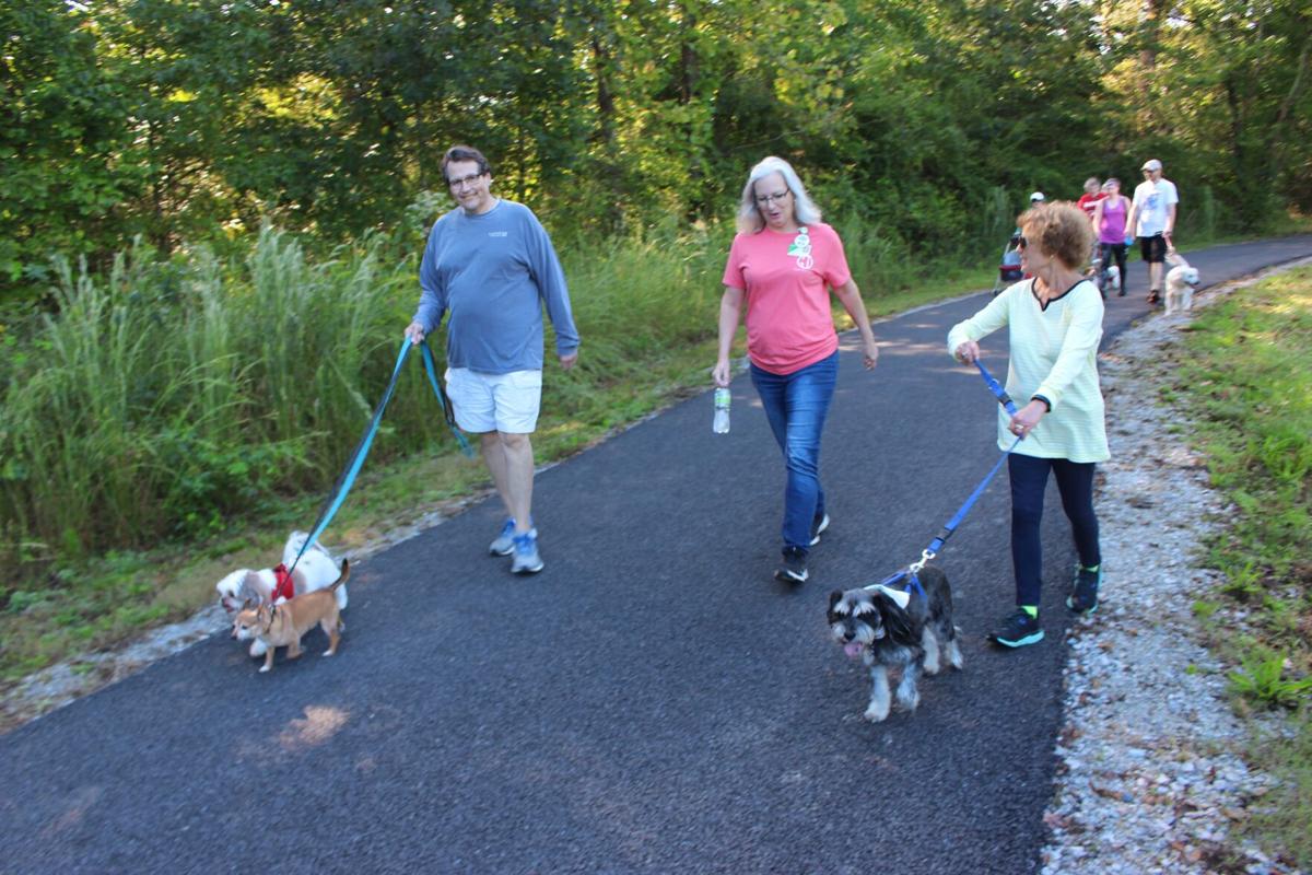 Compassionate Paws gather for "Pet Walk" Saturday morning at Mount Berry Trail