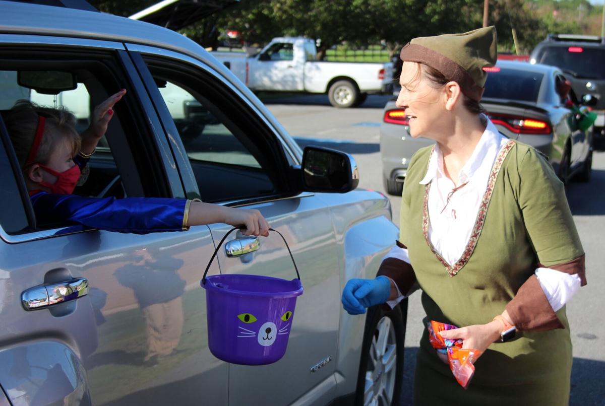 Rockmart city employees hold drive-thru trick or treating