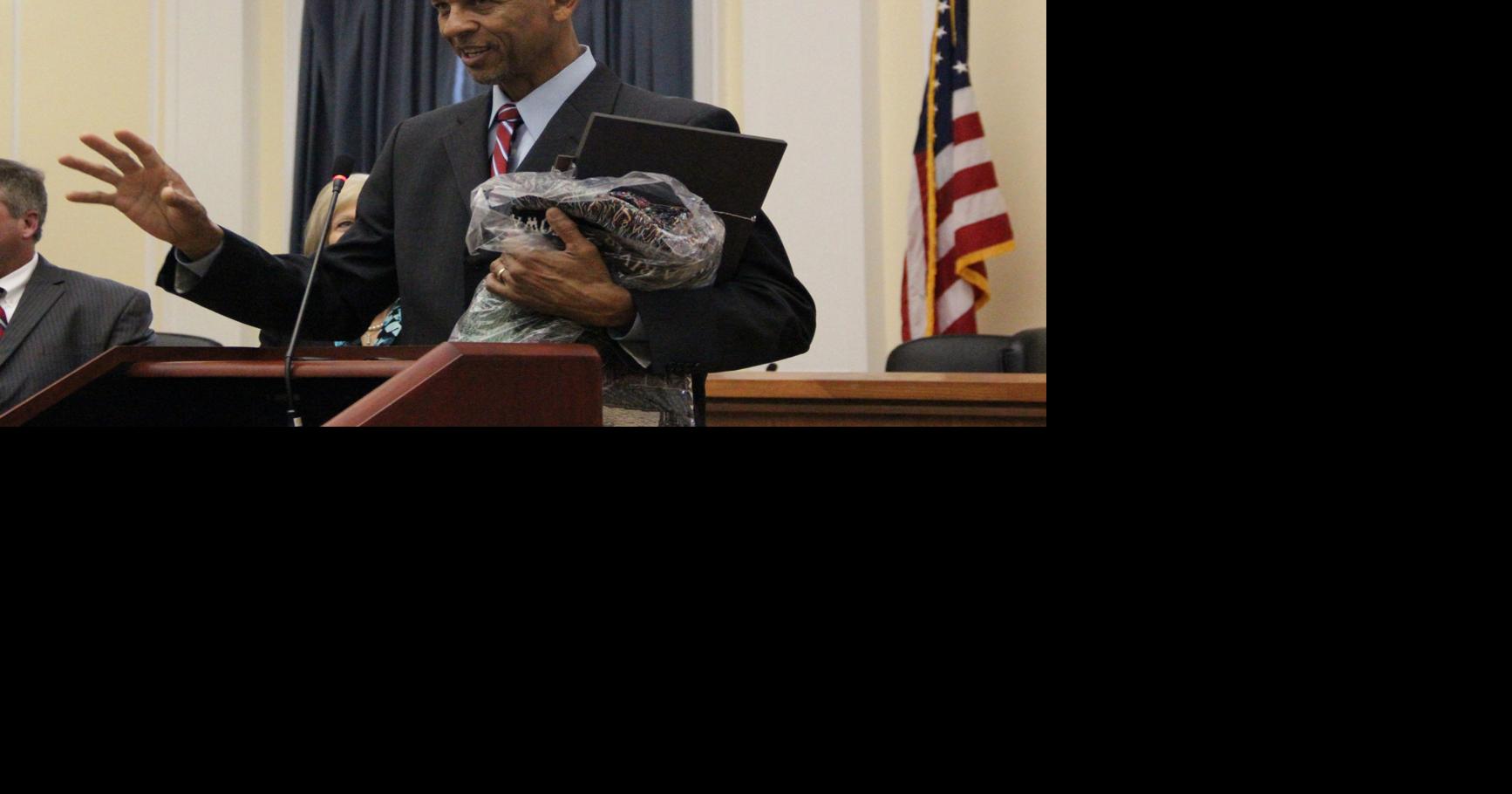 Commissioner John Mayes hammers gavel for last time, to step down at