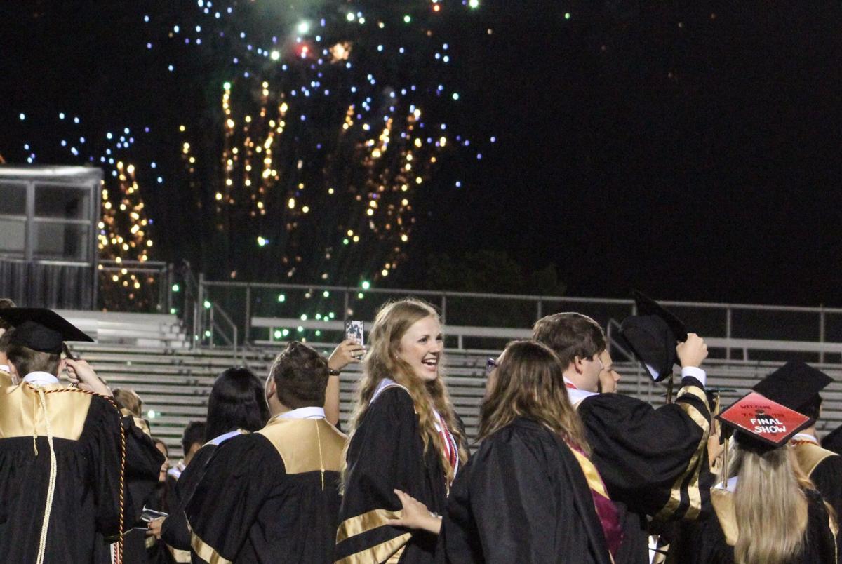 Rockmart graduates wait out rain for ceremony
