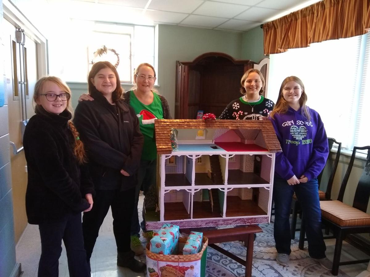 Girl Scouts donated doll house to Exchange Club Family Resource Center